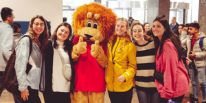 Percy the Lion with students