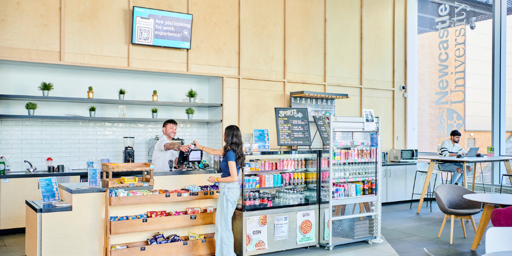 Student buying item from café