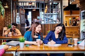 Two students studying at desk