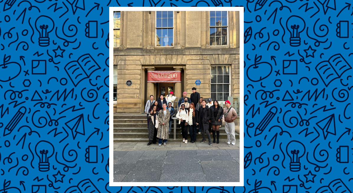 a group of students standing outside the Lit and Phil