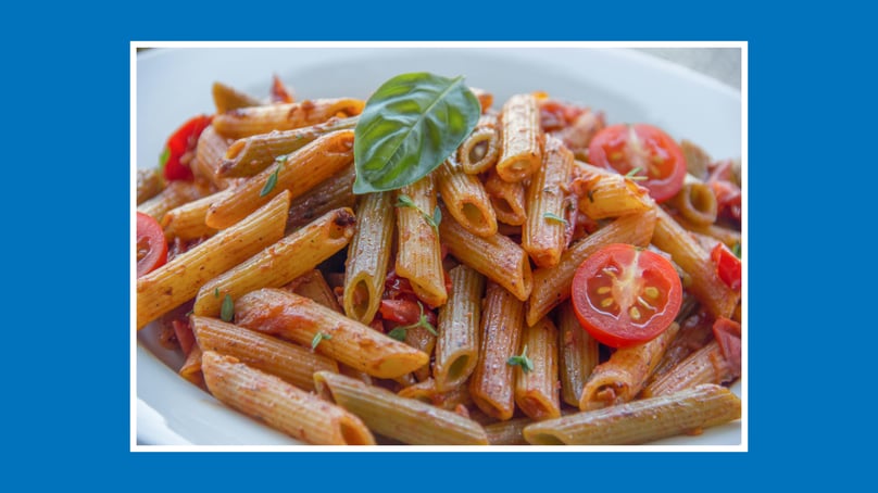 penne pasta with vegetables and tomato