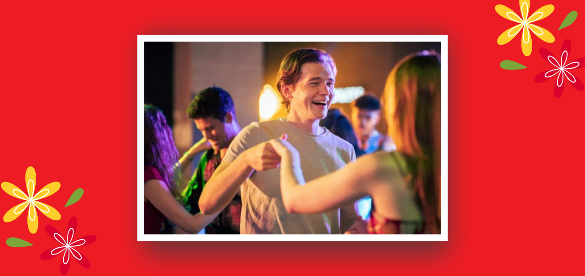 Boy and girl laughing and dancing 
