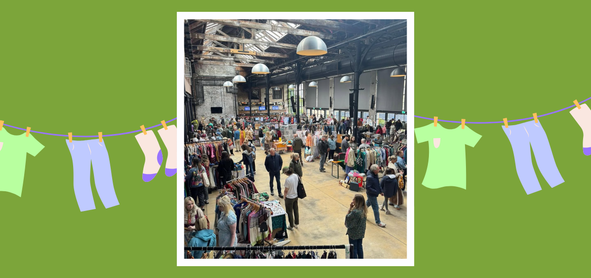 Crowd of people looking at clothes 