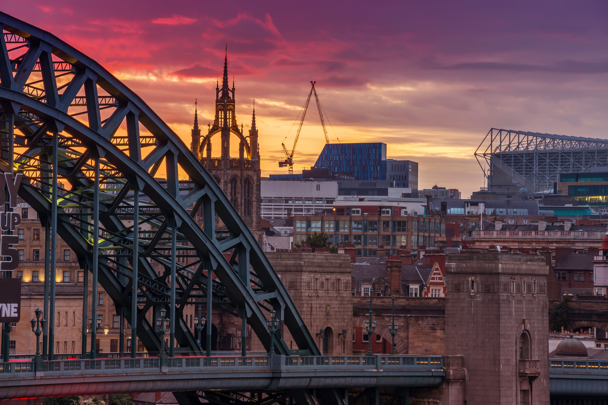 view of the the Tyne Bridge and cityscape at dusk